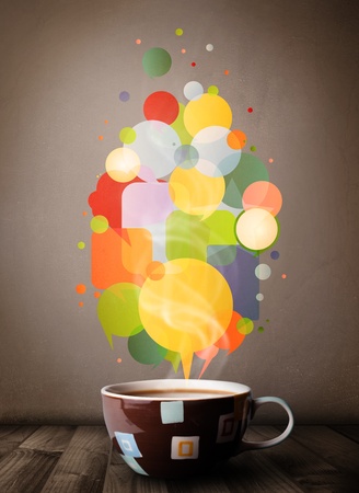 Tea cup with colorful speech bubbles, close upの写真素材
