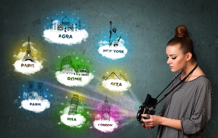 Tourist photographer girl making images of famous places around the worldの写真素材