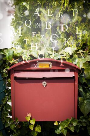 Street mail box with letters comming outの写真素材