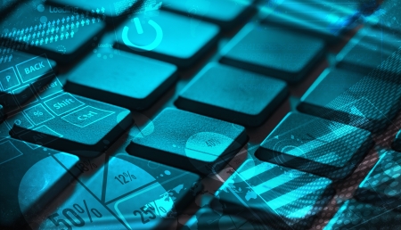 Computer keyboard with glowing charts, digital marketing concept