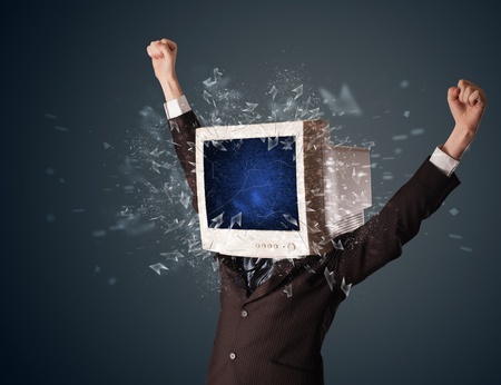 Computer monitor screen exploding on a young persons head concept