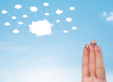 finger smiley faces on hand with cloud network systemの写真素材