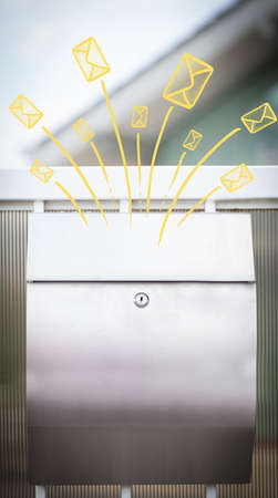 Hand drawn letters and envelopes comming out of a mailboxの写真素材