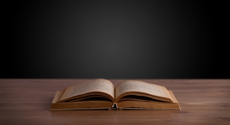 Open book on wooden deck and copy spaceの写真素材