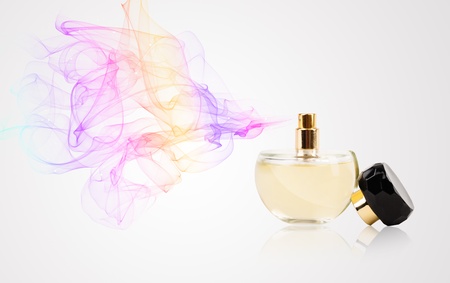 Perfume bottle spraying colorful scentの写真素材
