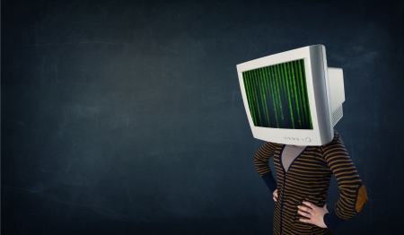 Cyber business human with a monitor screen and computer code on the display