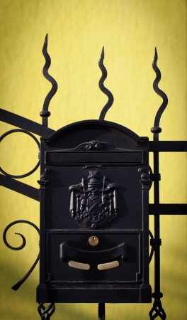 Cloes up of a mailbox on the street with fenceの写真素材