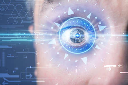 Modern cyber man with technolgy eye looking into blue iris
