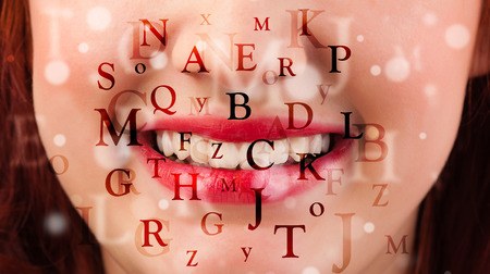 Beautiful girl lips breathing fonts and characters close upの写真素材