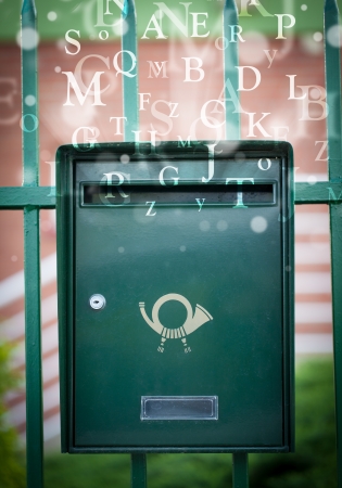 Street mail box with letters comming outの写真素材