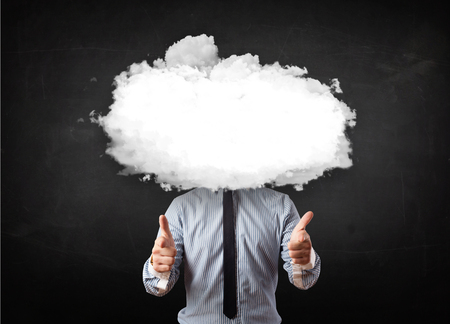 Business man with white cloud on his head concept on grungy backgroundの写真素材