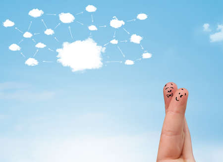 finger smiley faces on hand with cloud network systemの写真素材