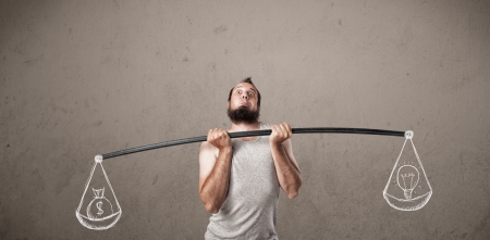 Funny skinny guy trying to get balanced の写真素材