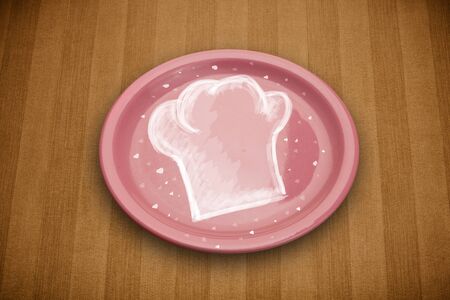 Colorful plate with hand drawn white chef symbol on grungy backgroundの写真素材