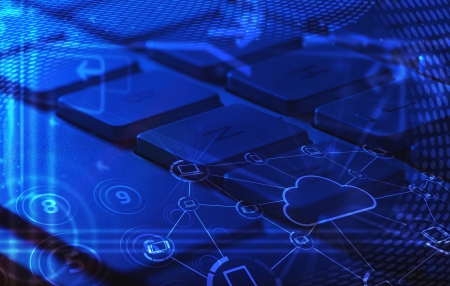 Computer keyboard with glowing cloud computing and multimedia iconsの写真素材