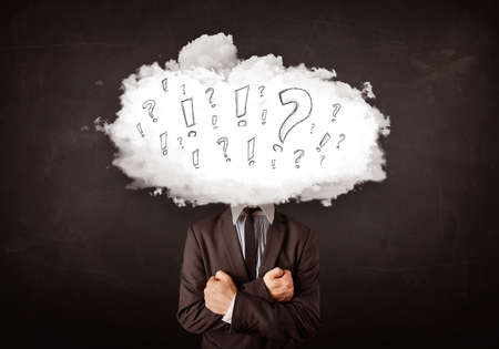 Business man cloud head with question and exclamation marks conceptの写真素材