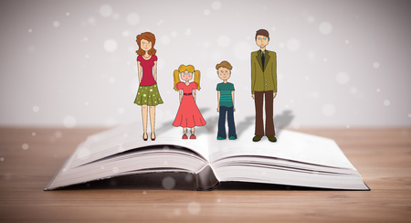 Drawing of a happy family on opened book. The symbol of unity and happinessの写真素材