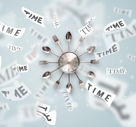 Clock and watch concept with time flying away on paper