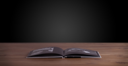 Open book on wooden deck and copy spaceの写真素材