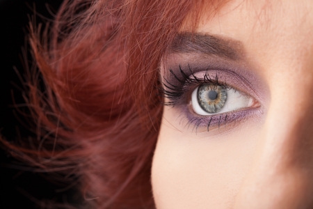 Beautiful portrait of a pretty girl close up eyeの写真素材