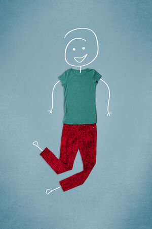 Colorful placed clothes in different actions with woman drawingの写真素材