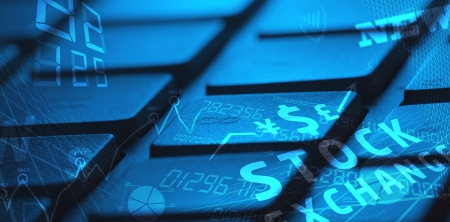 Computer keyboard with glowing business management icons and diagramの写真素材
