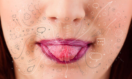 Pretty woman mouth blowing hand drawn icons and symbols close upの写真素材