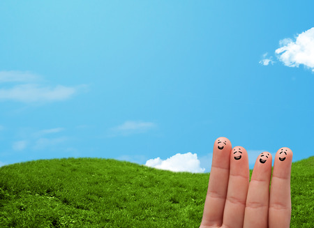 Cheerful happy smiling fingers with landscape scenery at the background