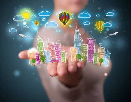 Young beautiful woman presenting hand drawn metropolitan cityの写真素材