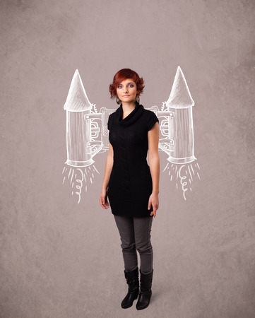 Cute young girl with jet pack rocket drawing illustrationの写真素材
