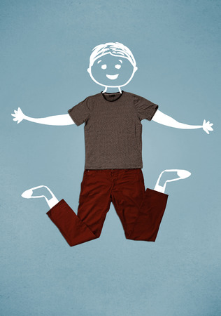 Funny cute smiley hand drawn character in casual clothesの写真素材