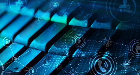 Computer keyboard with glowing icons, social networking conceptの写真素材