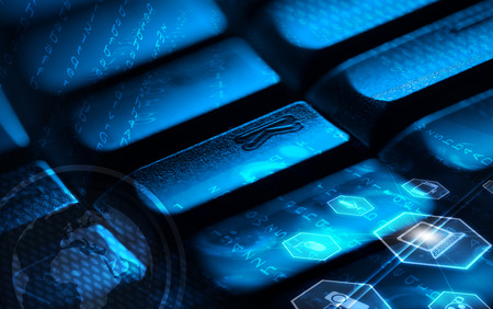 Computer keyboard with glowing globe and multimedia icons