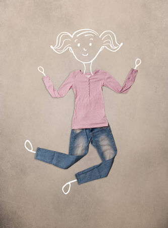 Colorful placed clothes in different actions with woman drawingの写真素材