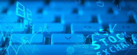 Computer keyboard with glowing business management icons and diagramの写真素材