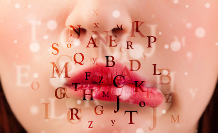 Beautiful girl lips breathing fonts and characters close upの写真素材