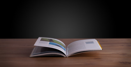 Open book on wooden deck and copy spaceの写真素材