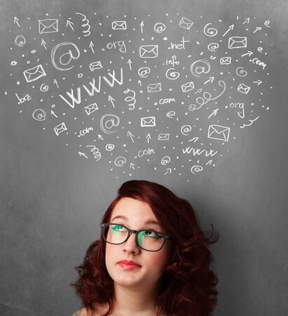 Pretty young woman gesturing with sketched social network icons above her headの写真素材