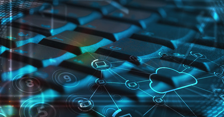 Computer keyboard with glowing cloud computing and multimedia icons