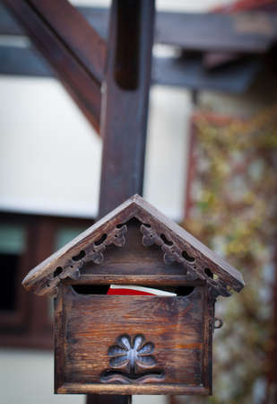 Cloes up of a mailbox on the street with fenceの写真素材