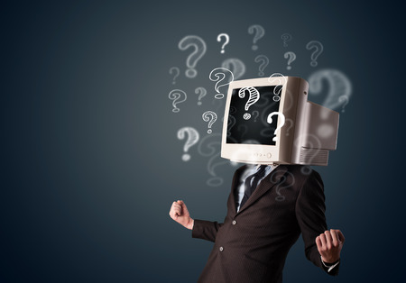 Businessman with a computer monitor head and question marks