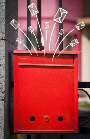 Hand drawn letters and envelopes comming out of a mailboxの写真素材