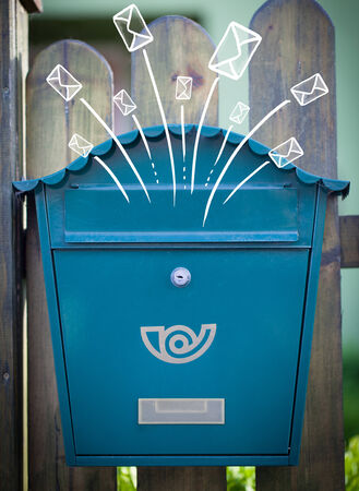 Hand drawn letters and envelopes comming out of a mailboxの写真素材