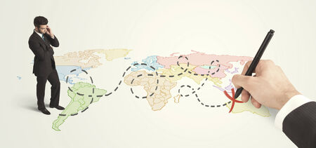 Businessman looking at map and route drawn by hand concept on backgroundの写真素材