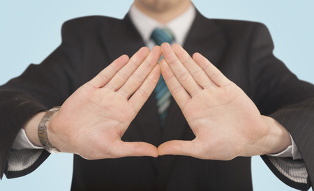 Close up of hands creating a formの写真素材