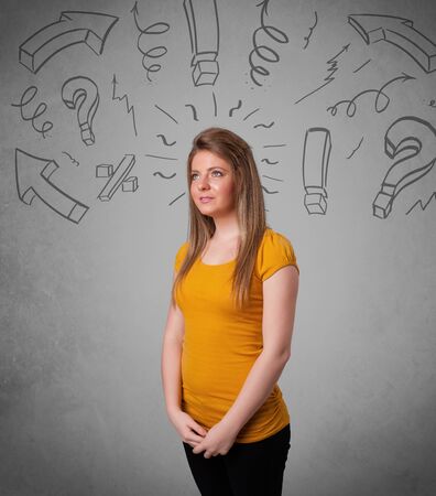 Cute young girl with question sign doodles on gradient backgroundの写真素材