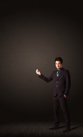 Businessman makings gestures with his handsの写真素材