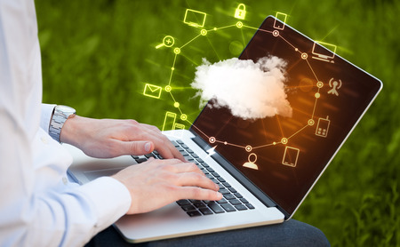 Hand working with a Cloud Computing diagram, new technology conceptの写真素材