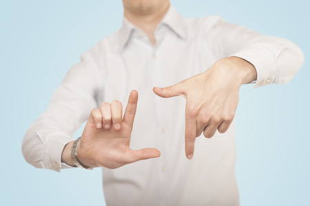 Close up of hands creating a formの写真素材
