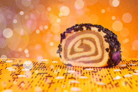 Close up of delicious tasty homemade cakes with bokeh light backgroundの写真素材